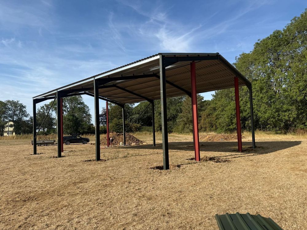 Steel-frame agricultural shed