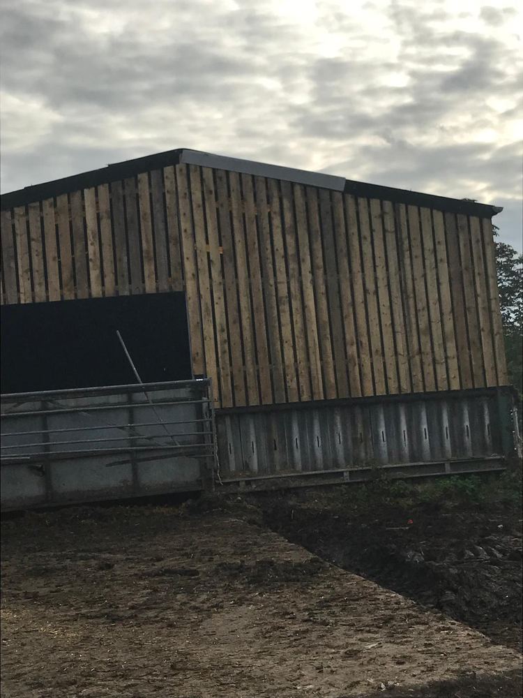 Timber-clad agricultural barn
