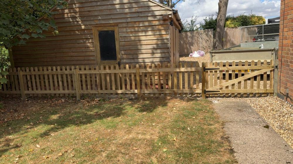 Timber-clad studio, walkway & gate