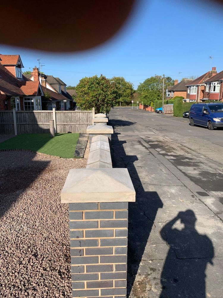 Block-paved driveway & brick piers