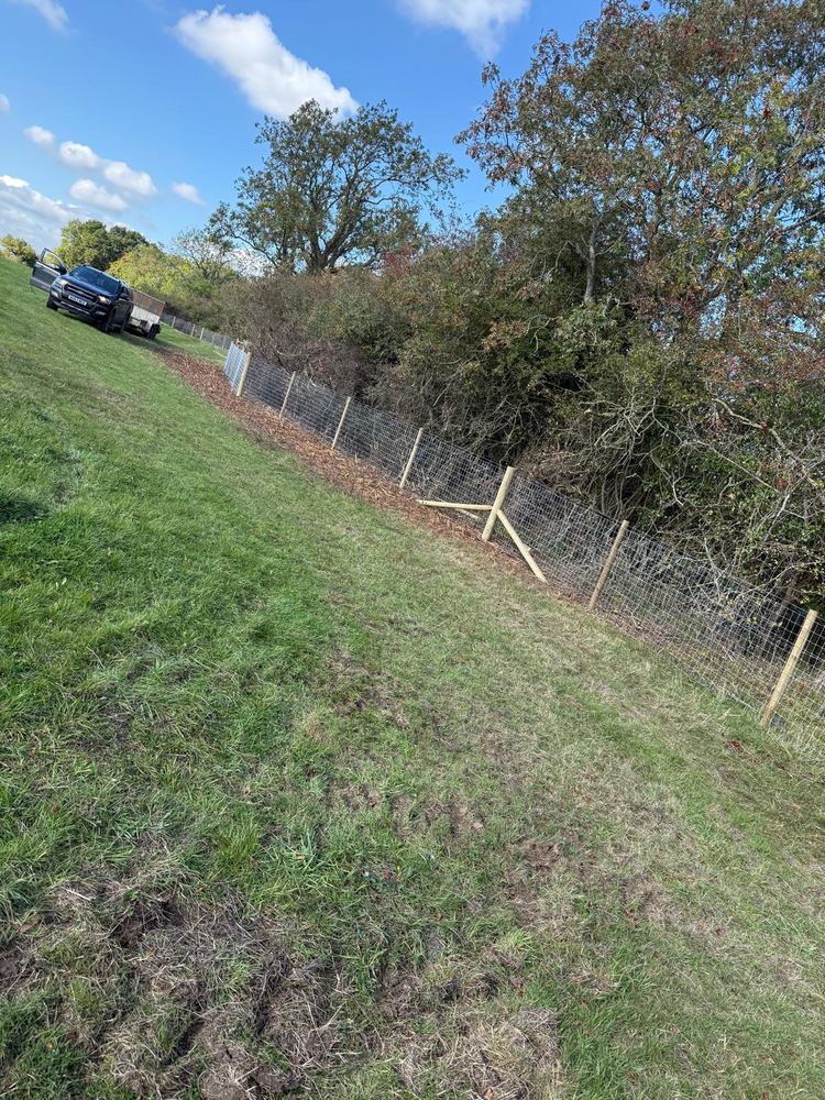 Stock fencing on sloping ground