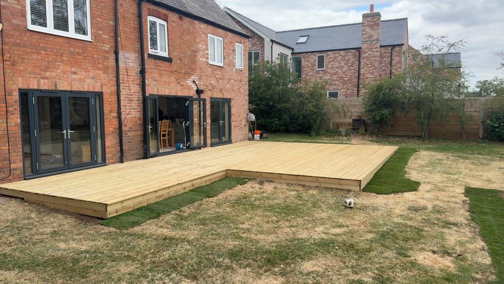 New close-board fence & turfed garden